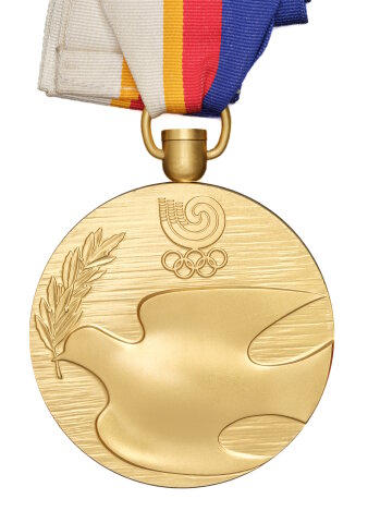 Goldmedaille mit Prägung: Friedenstaube mit Zeig und Olympia Logo