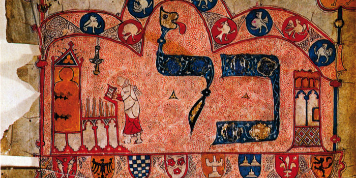 ein altes Pergament mit hebräischen Buchstaben und der Illustration eines Toraschreins sowie verschiedener Wappen